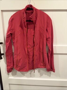 Lululemon Scuba jacket, color is pink/orange/reddish. Lots of life left!